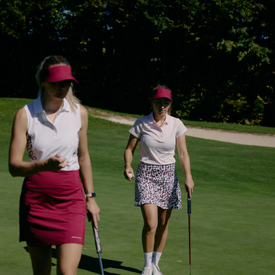 Golfkjol I Röhnisch Golf Nicky Skort I Beet Red