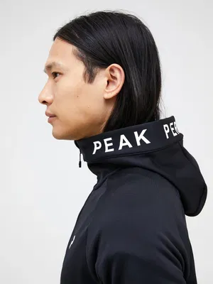 Golf hoodie Peak Performance Rider Zip Hood Svart