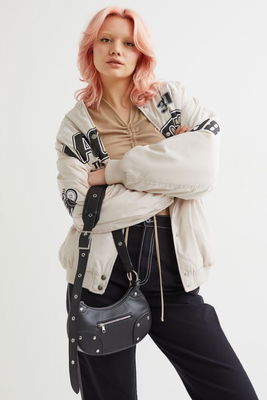 Liten axelremsväska