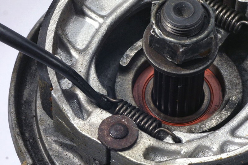 HEADLIGHT AND BRAKE SPRING