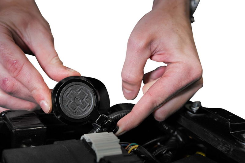 MOTORCYCLE AIR TAG HOLDER