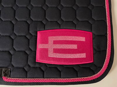 Hoppschabrak med E-logga Cerise/rosaglitter