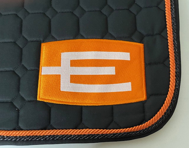 Hoppschabrak med E-logga orange