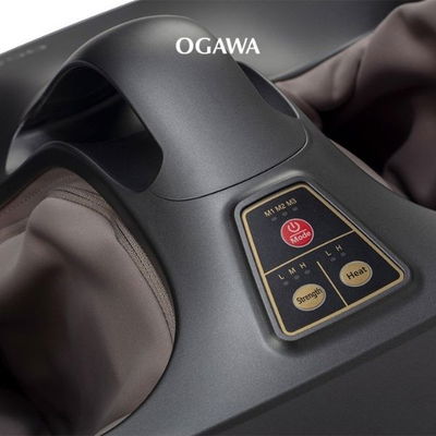 Fotmassasjeapparat med integrert bærehåndtak og moderne design i svart/rødt.