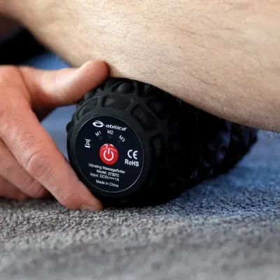 Nærbilde av benet som blir massert