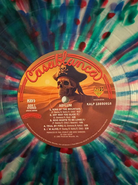 KISS LP Asylum Lila/Röd/Gul/Blå Splatter vinyl Alternativomslag med poster
