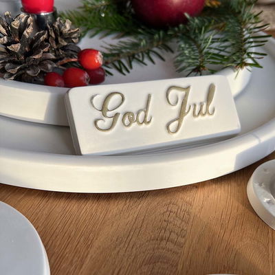 Inspiration god jul skylt skrivstil med guldtext