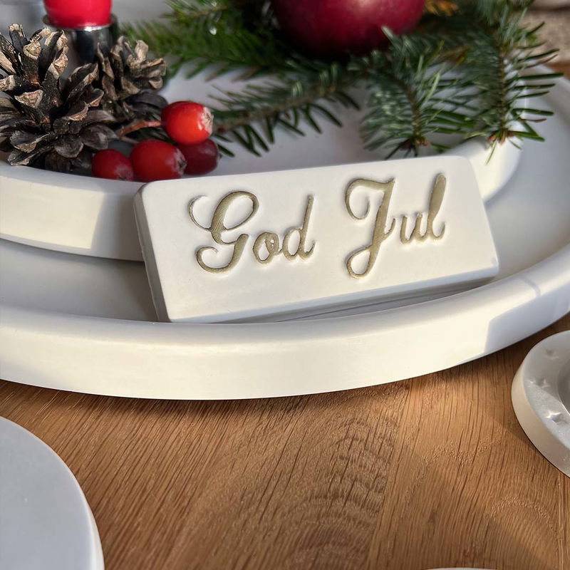 Inspiration god jul skylt skrivstil med guldtext