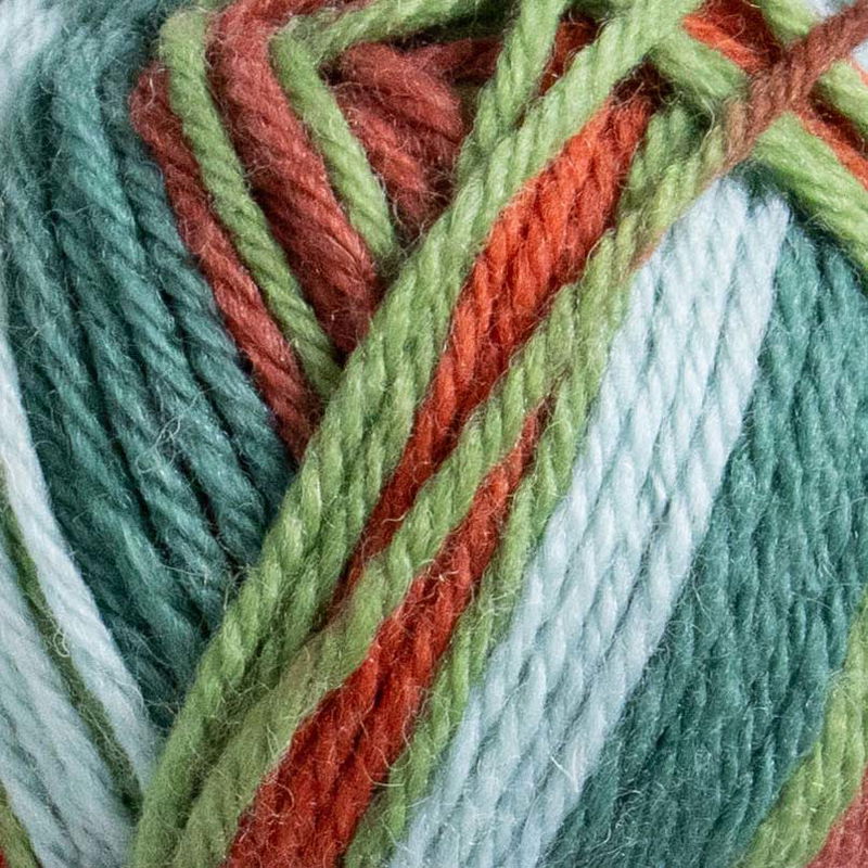 Närbild av Järbo Raggi A Christmas Carol sockgarn med julens färger