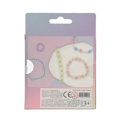 Baksida av glaspärlor blågröna mixade färger 90 g med exempel på armband och halsband