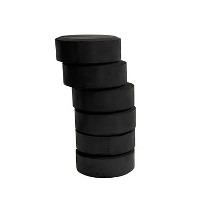 Färgpuckar, vattenfärg i färgen onyxsvart, staplade på varandra.