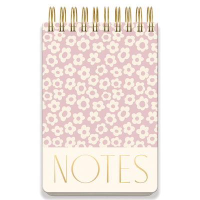 Anteckningsblock Lilac Groovy Floral, framsida Stor anteckningsblock från DesignWorks Ink med lila blommönster och guldfolierad titel NOTES på omslaget.