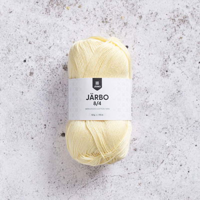 Järbo 8/4 50 gram. Pastellgult bomullsgarn. 100% bomull.