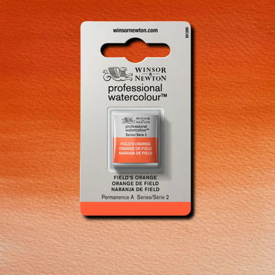Färgprov och förpackning, Field's Orange halvkopp Winsor & Newton Professional Water Colour Field's Orange i halvkopp som visas mot målad bakgrund i samma färg.
