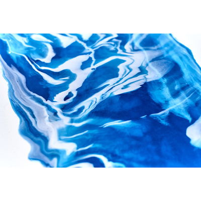 Inspirationsbild med Liquitex Pouring medium blandat med blå färg