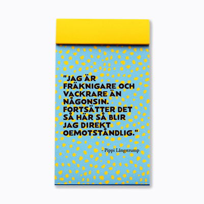 "Miniblock med citat från Pippi Långstrump:"Jag är fräknigare och vackrare än någonsin. Fortsätter det så här så blir jag direkt oemotståndlig."