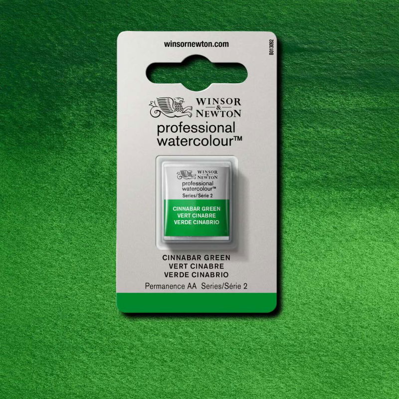 Winsor & Newton Professional Water Colour Cinnabar Green i halvkopp som visas mot målad bakgrund i samma färg.