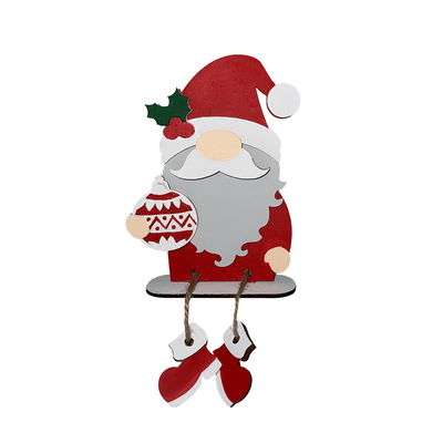 Tomte i trä som håller en julkula, handmålad träfigur från Cria som DIY-kit