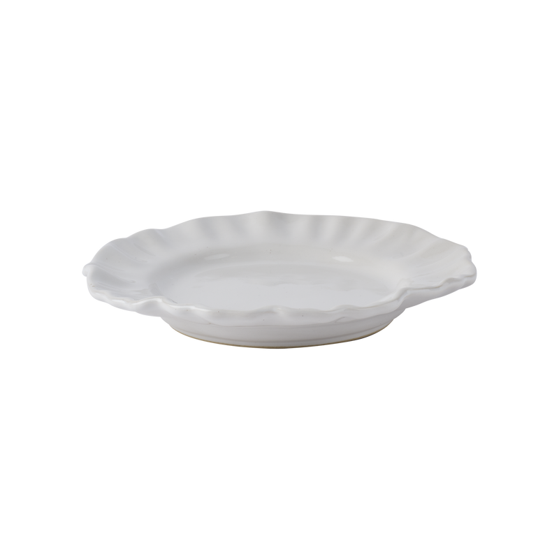 vita blomformade assietter - elegant bordsdukning