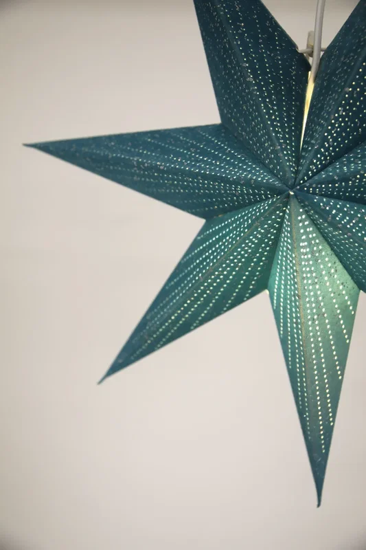 Blå julstjärna i sammet med glitter