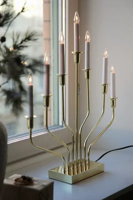 Mässingsljusstake med böjda armar