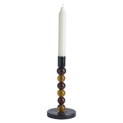 Brun ljusstake i glas