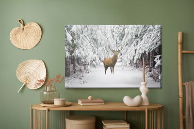 Ljuddämpande tavla - Deer in the winter forest