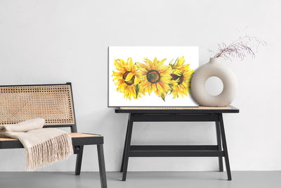 Ljuddämpande tavla - Three sunflowers on a white