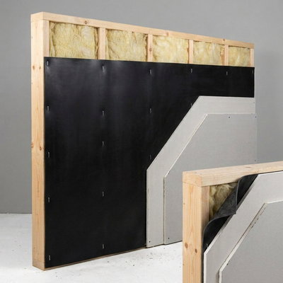 SilentDirect MLV installed in a wall with wooden studs before drywall installation