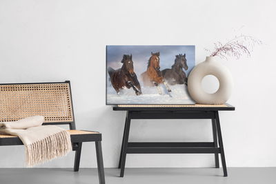 Ljuddämpande tavla - Galloping horses in winter