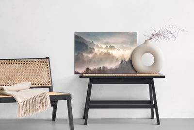 Ljuddämpande tavla - Mist in forest with sunbeam