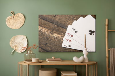 Ljuddämpande tavla - Aces on a wooden table
