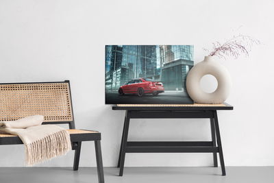 Ljuddämpande tavla - Red car in the city