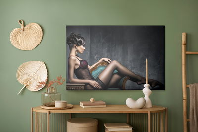 Ljuddämpande tavla - Woman on the couch