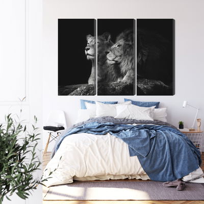 Ljuddämpande tavla - Lion and lioness on a black