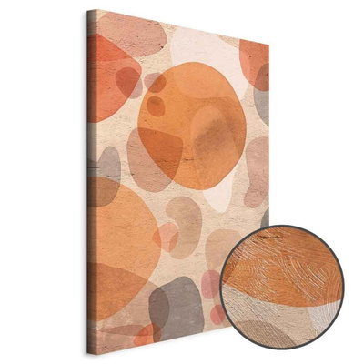 Schuin productaanzicht van Amber kaleidoscope. Het motief loopt door over de randen van het canvas. Een ronde detailopname toont het reliëf van het geloppervlak.