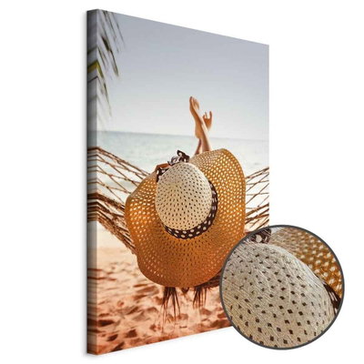 Schuin productaanzicht van Hammock on the beach. Het motief loopt door over de randen van het canvas. Een ronde detailopname toont het reliëf van het geloppervlak.