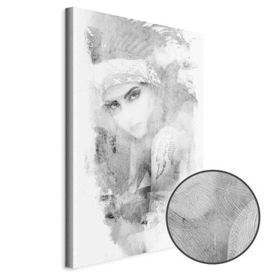 Schuin productaanzicht van Ethnic look. Het motief loopt door over de randen van het canvas. Een ronde detailopname toont het reliëf van het geloppervlak.