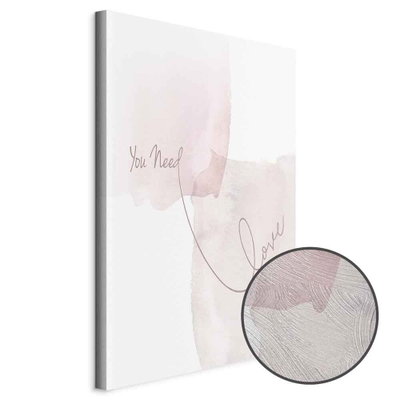 Schuin productaanzicht van You need love. Het motief loopt door over de randen van het canvas. Een ronde detailopname toont het reliëf van het geloppervlak.