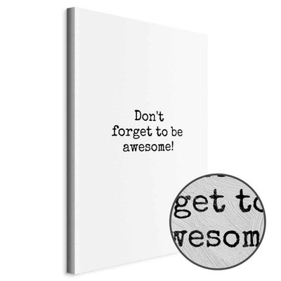 Schuin productaanzicht van Don& t forget to be awesome. Het motief loopt door over de randen van het canvas. Een ronde detailopname toont het reliëf van het geloppervlak.