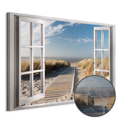 Schuin productaanzicht van Window view of the beach. Het motief loopt door over de randen van het canvas. Een ronde detailopname toont het reliëf van het geloppervlak.
