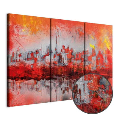 Schuin productaanzicht van New york sunset. De 3 canvasdelen vormen samen één compositie. Een ronde detailopname toont het reliëf van het geloppervlak.