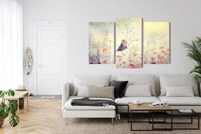 Ljuddämpande tavla - A bird among wild flowers