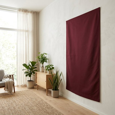 SilentDirect Acoustic Wall Textile in red, installed in the living room