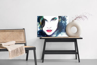 Ljuddämpande tavla - A female face