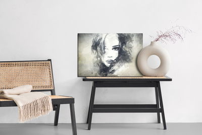 Ljuddämpande tavla - A female face