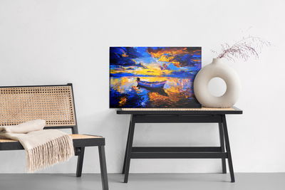 Ljuddämpande tavla - Empty boat in the sea