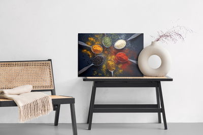 Ljuddämpande tavla - Coloured spices on spoons