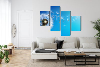 Ljuddämpande tavla - Dandelion with flying seeds