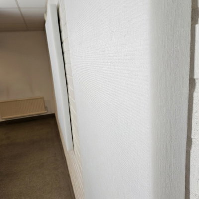 SilentDirect PES Allergy Wall sound absorbers, 50 mm thick, mounted along the wall in the room